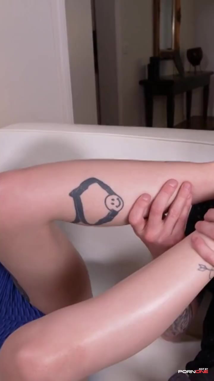 purple haired goth girl gives footjob   - Short by pornone.com