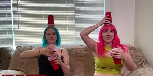 Bea & Lizzy are a lesbian couple playing a naughty strip game
