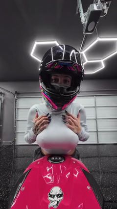 BIG BOOB MILF ON HER MOTORCYCLE