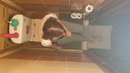 Dominatrix girl in the toilet without mercy fucked strapon her slave man in the ass