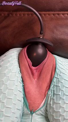 Inflatable Toy Stretches Her Wide Open