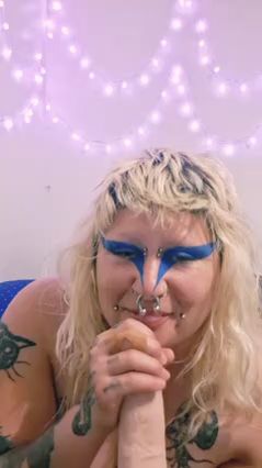 Punk Girl's Naughty Tease with Dildo Blowjob Action