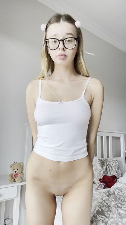 Teen girl with a perfect body takes off her panties