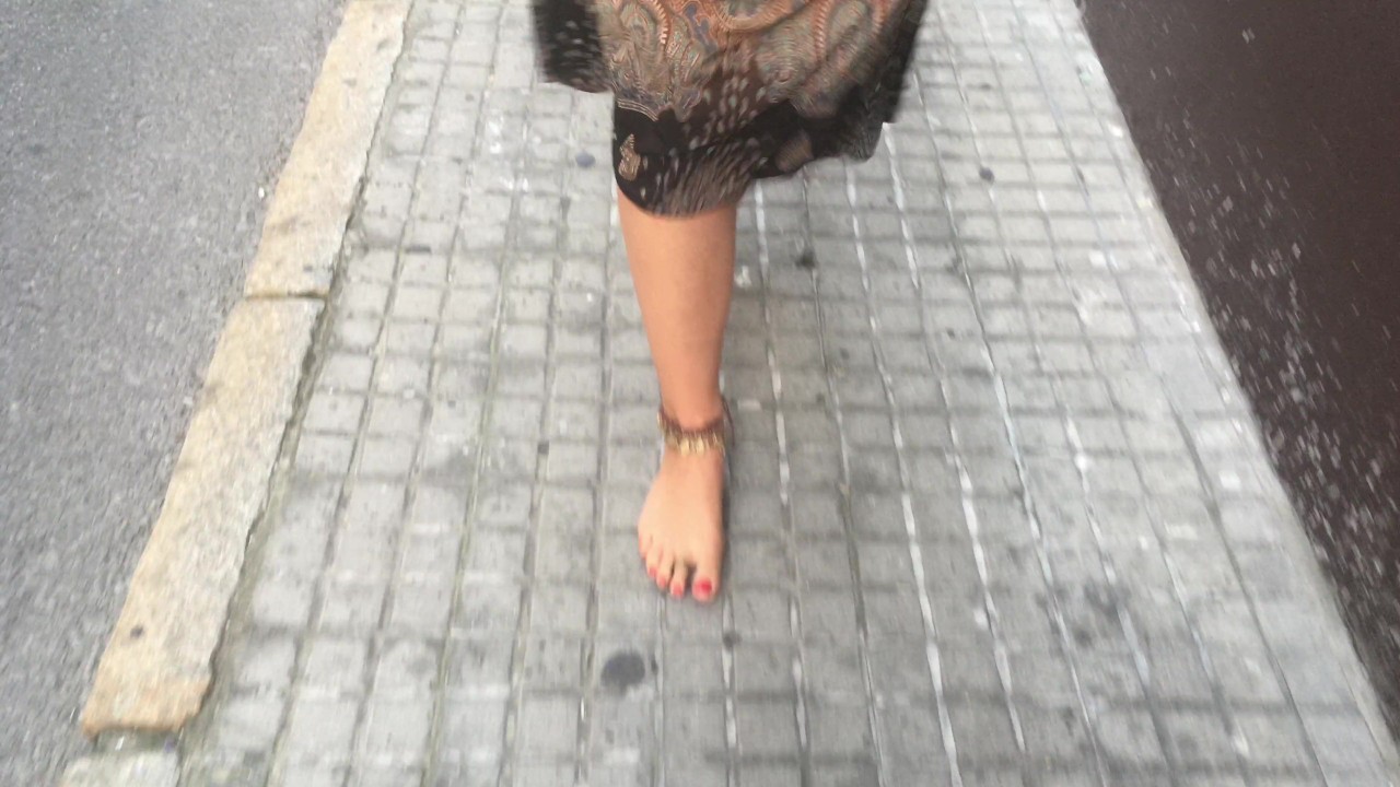 Hippie Chick Walks Barefoot in Public Street Scene