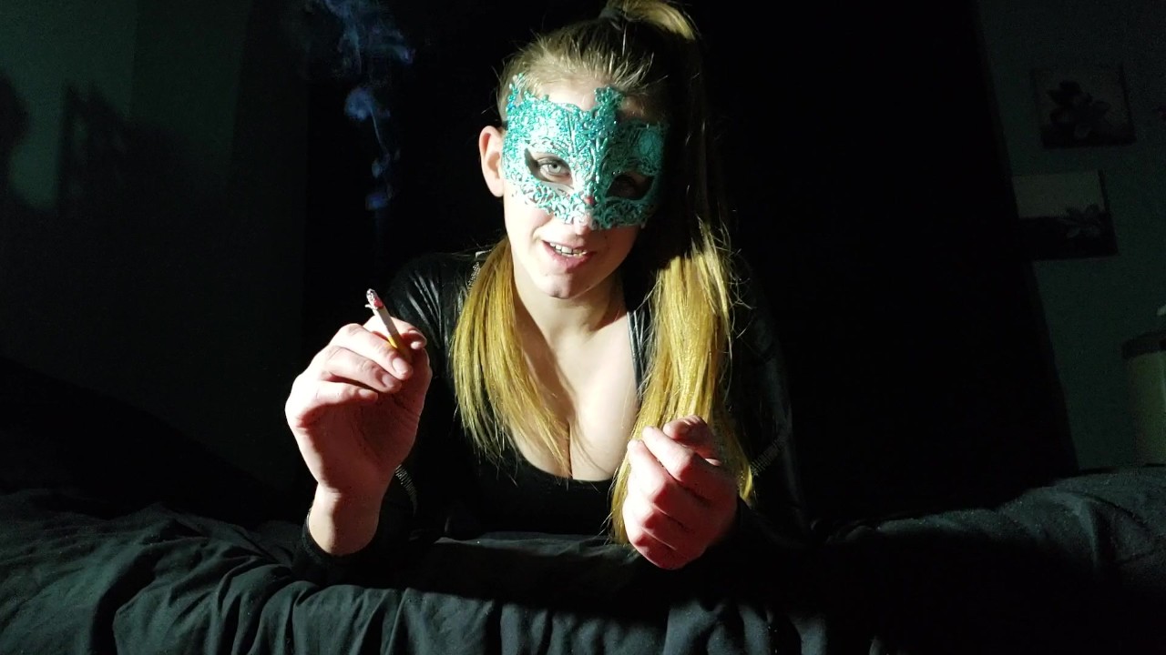 Latex Mistress Enjoys Smoking Fetish Session