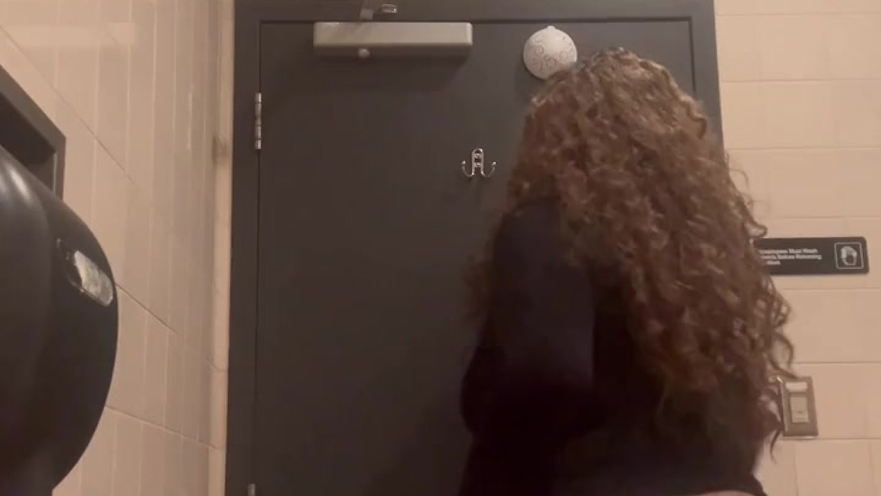 Cheerleader's Sticky Situation in Walmart Bathroom