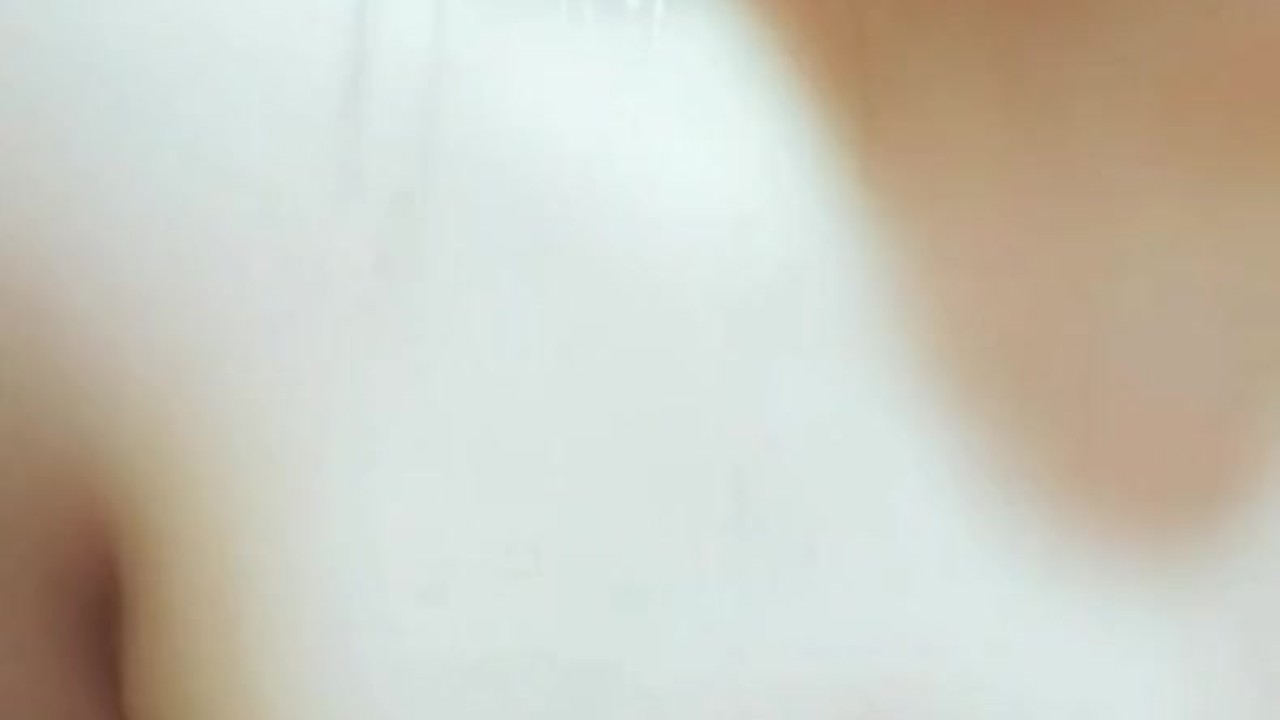 Steamy Post-Gym Shower Scene Unfolds