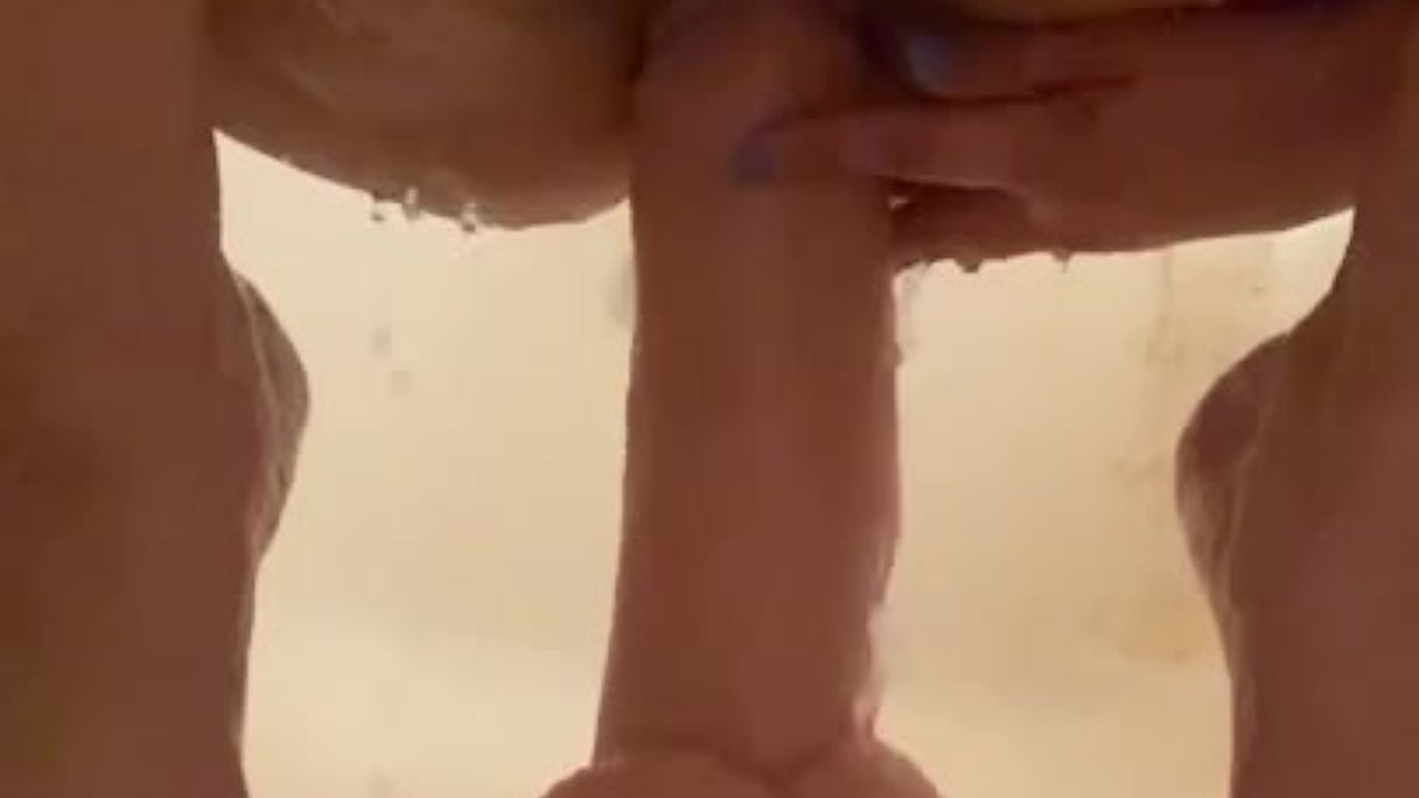 Slow motion giant dildo in the shower 
