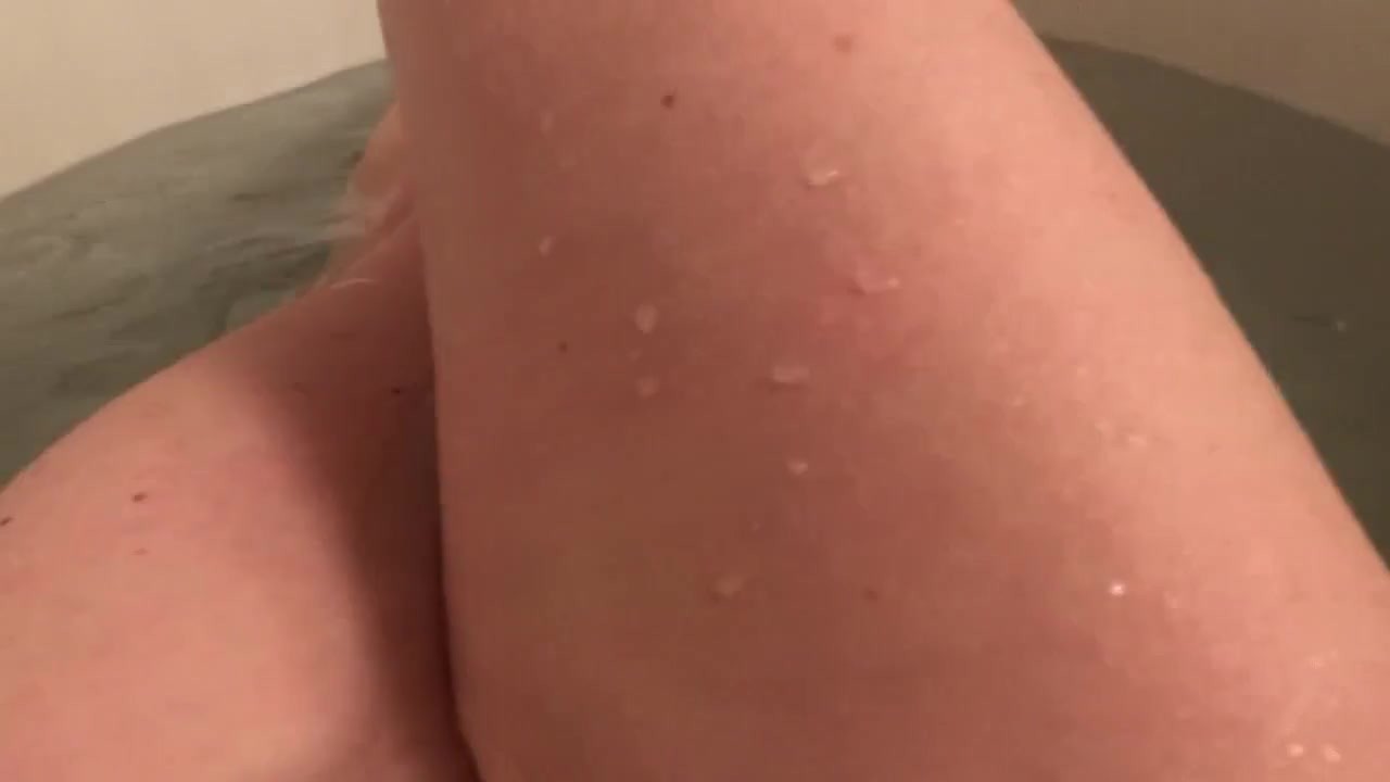Bathing Beauty Plays Solo in the Tub