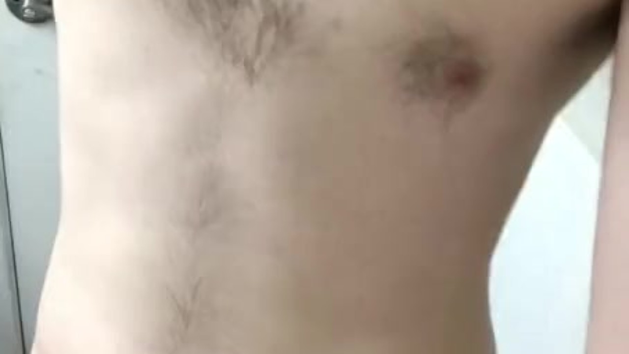 Shower Time: Slim Guy Prepares for a Refreshing Experience