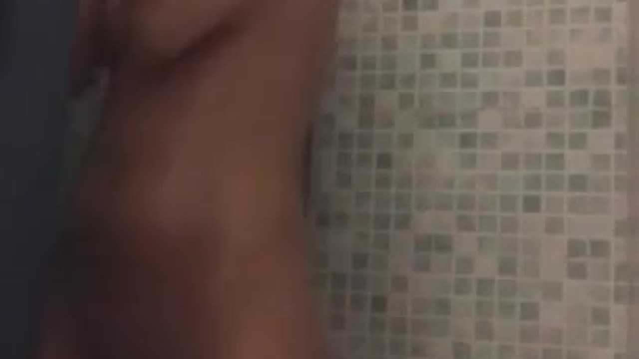 Latina gets interrupted while showering